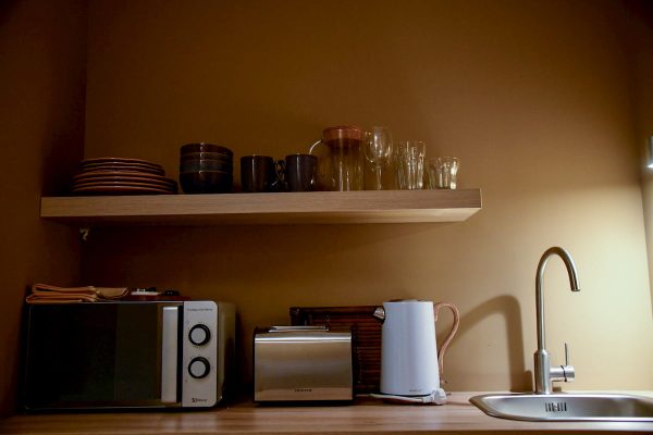 Eça Agora Guest House in Vila do Conde | The Capital bedroom: small meal area with fridge, microwave, toaster