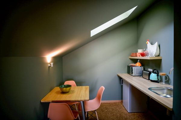 eca-agora-guest-house-vila-do-conde-the-egypt-room-2-individual-beds-sofa-bed-bathroom-with-meating-area-slider-12
