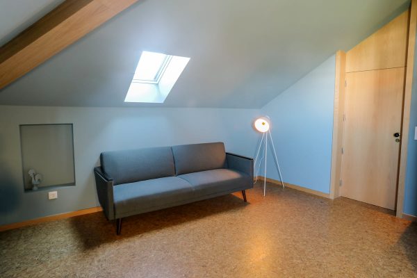 eca-agora-guest-house-vila-do-conde-the-maias-room-king-sized-bed-sofa-bed-bathroom-with-meating-area-slider-8