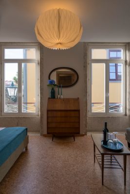 eca-agora-guest-house-vila-do-conde-the-mandarim-room-king-sized-bed-bathroom-with-meating-area-slider-8
